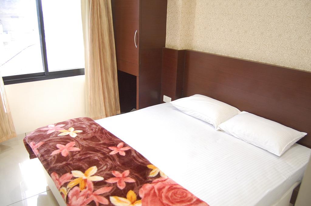 Hotel Poonam Palace Ujjain Værelse billede